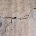 From Cracks to Crumbling: Understanding the Causes of Concrete Damage